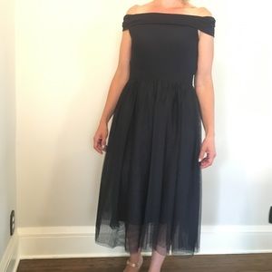 Elegant navy blue dress with tulle skirt